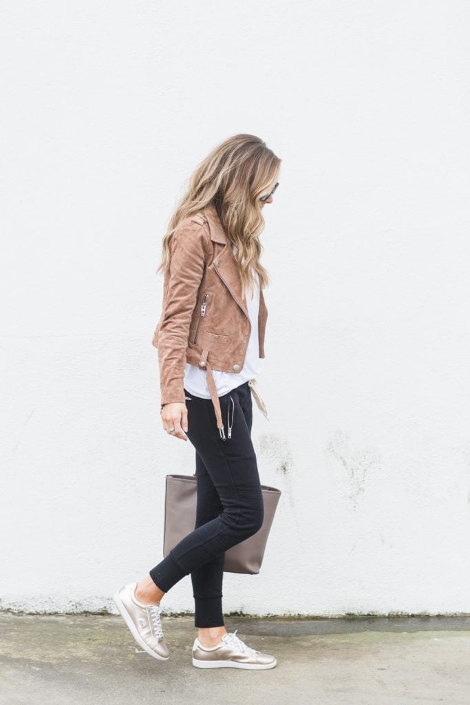 white tee with black joggers and sneakers