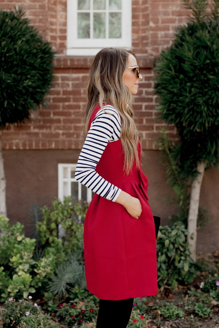 this bold red dress has pockets!