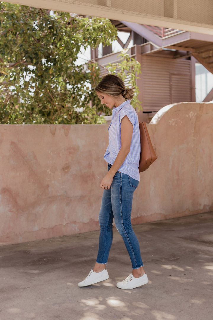 half tuck your shirt to make it a little more casual while elongating your legs