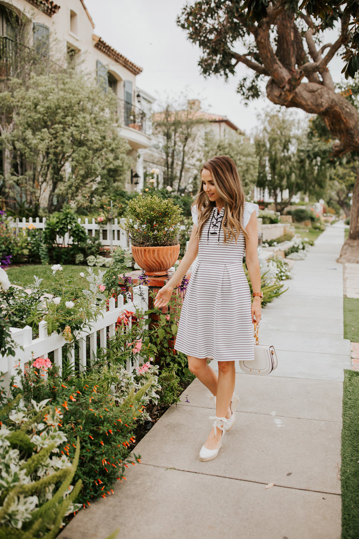 this cute striped dress would be perfect for a spring wedding, but also church or date night or almost any other occasion!