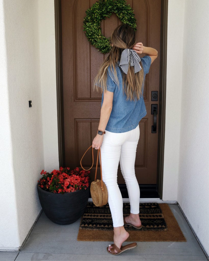 denim top and white jeans