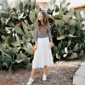 how to wear sneakers with a midi skirt