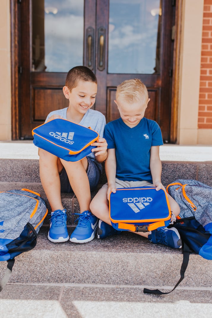 boys with blue lunchboxes