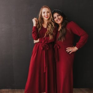 girls black background dark red dresses