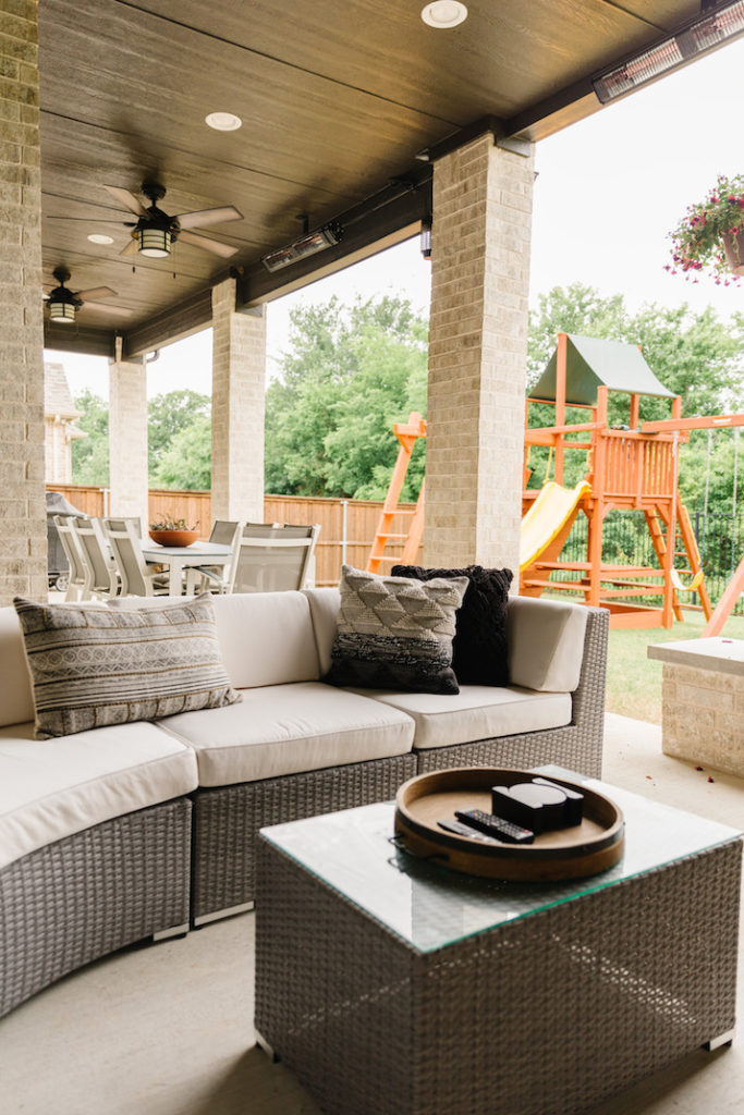 back patio with playset