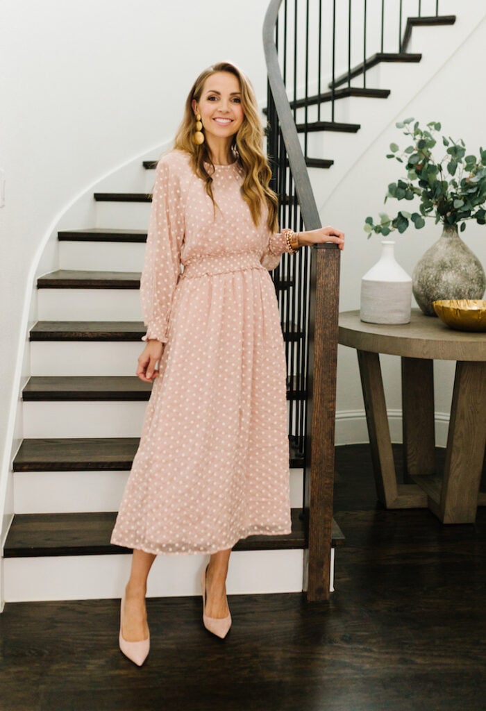 polka dot blush dress on the staircase